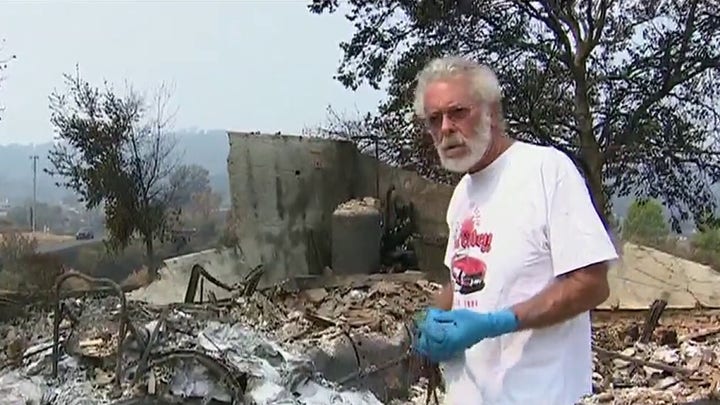 Residents assess damage as hundreds of wildfires continue to burn in California