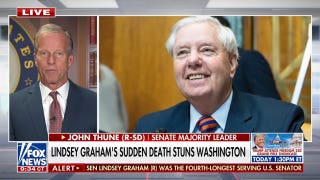 Senate Majority Leader John Thune reacts to Lindsey Graham's passing