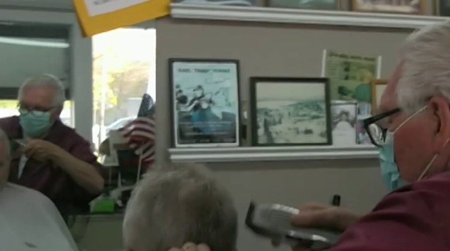77-year-old barbershop owner defies coronavirus order, reopens business