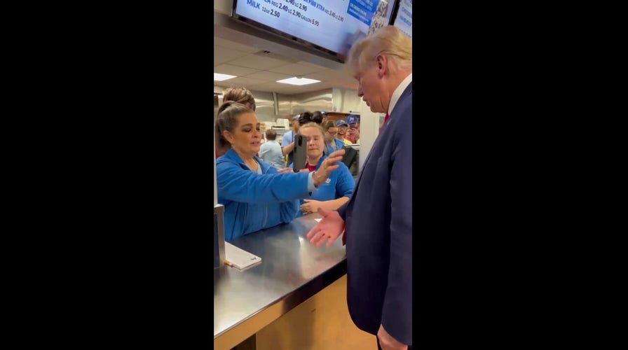 Trump spotted at South Carolina restaurant praying with employee