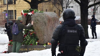 Russian police detain hundreds at memorials for Alexei Navalny