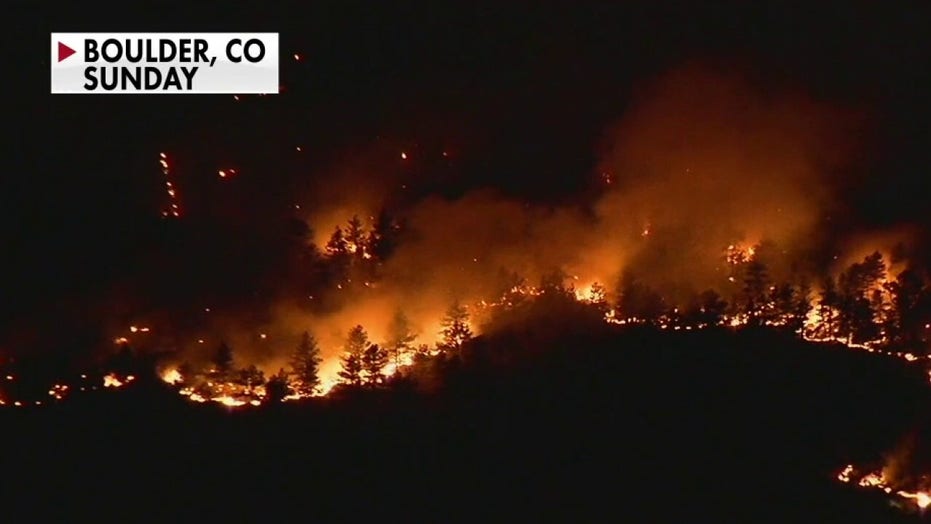 Colorado wildfires force thousands to evacuate, blaze 'just exploded