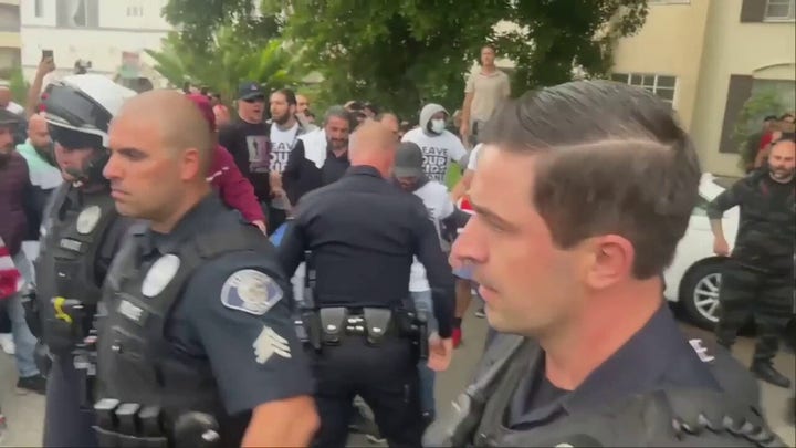 Brawl erupts as protesters clash over LGBTQ+ policies in school district