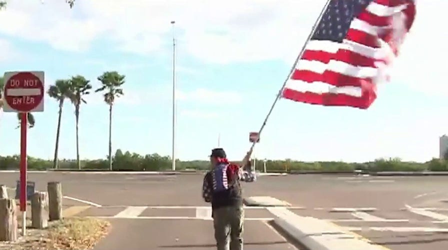 Florida man runs with US flag to honor first responders on COVID-19 frontlines