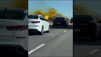 Arizona tanker truck rolls over, leaks hazardous material