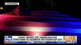 Family celebrates Independence Day by draping house in 50-foot American flag