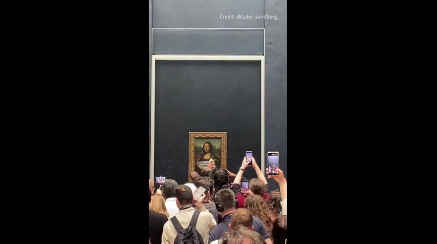Mona Lisa Vandalized with Cake as Protest