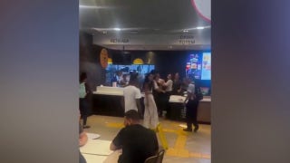 Brazil McDonald’s customer launches flying kick at worker