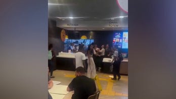 Brazil McDonald’s customer launches flying kick at worker