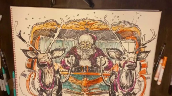 Artist Charlie Snogans finishes drawing of patriotic Santa Claus