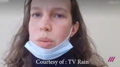 Russian woman, 21, details frightening treatment by police after anti-Putin protests