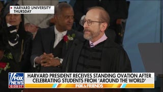 Harvard president takes shot at Trump in commencement speech