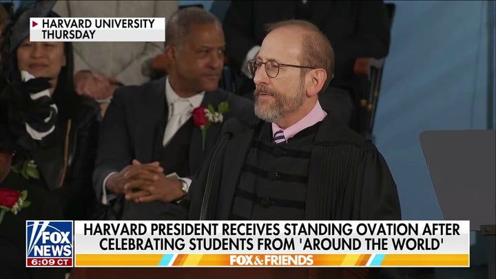 Harvard president takes shot at Trump in commencement speech