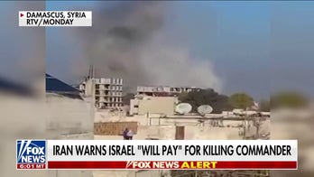 Iran warns Israel 'will pay' after killing commander 