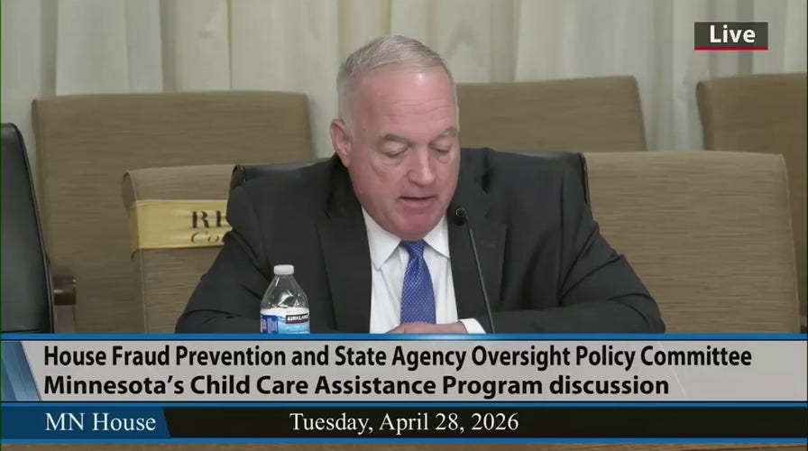 Former Minnesota investigator says a senior state government official illegally pressured him to delete child care fraud findings