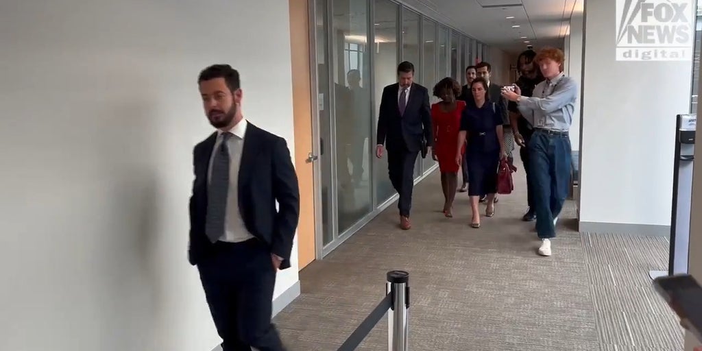 Former White House press secretary Karine Jean-Pierre enters for her deposition with House investigators