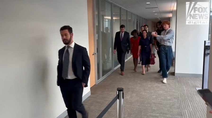 Former White House press secretary Karine Jean-Pierre enters for her deposition with House investigators