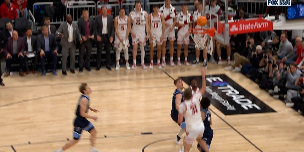 Wisconsin's Nolan Winter finishes put back, sending game to OT against Villanova
