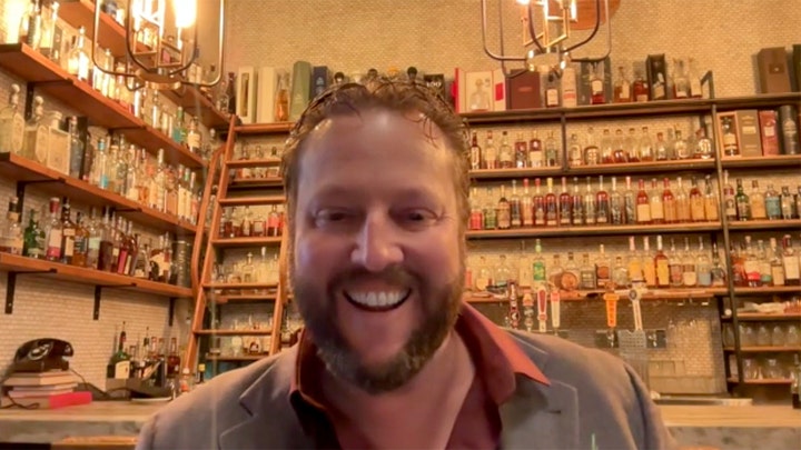 Restaurant exec defends tip system, says it drives 'hustle' and service