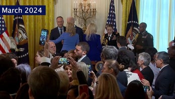 Allies, family, world leaders repeatedly guide Biden during public events