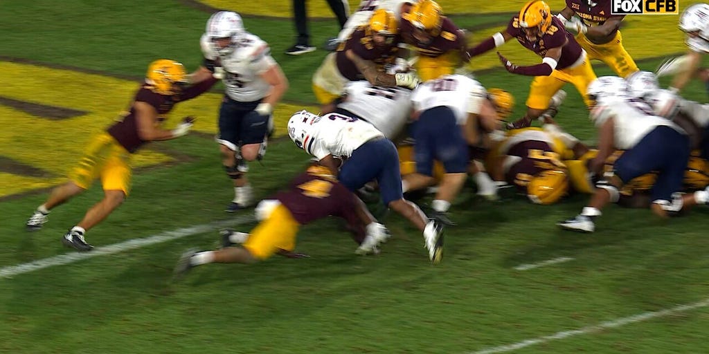 Arizona's Kedrick Reescano punches it in from one yard for the TD, extending lead over Arizona State