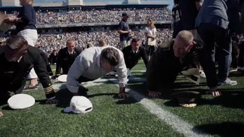 Pete Hegseth leads record-breaking pushup wave at Navy football game