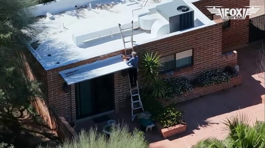 Drone footage captures enactment   connected  Nancy Guthrie’s home