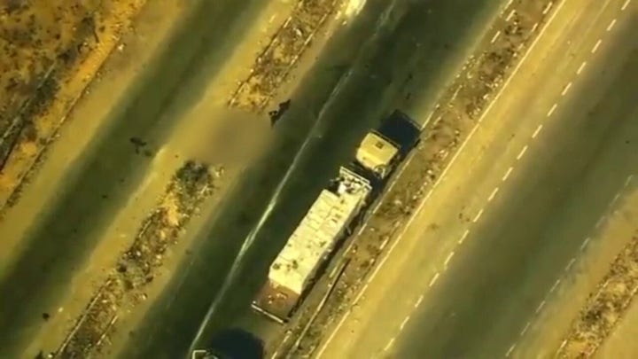 Suspected Hamas operatives loot truck delivering aid to Gazans