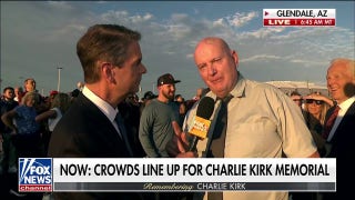 Charlie Kirk supporters gather in front of State Farm Stadium ahead of memorial