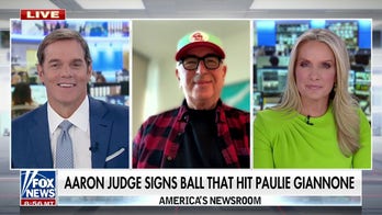 Aaron Judge signs ball that hit Paul Giannone in the head