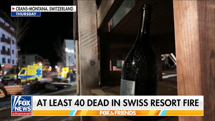 Swiss Alps bar witness says champagne bottles with sparklers started deadly NYE fire