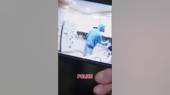 Man caught on camera allegedly trying to POISON roommates