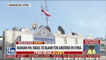 Iran threatens 'harsh' response after airstrike kills top general