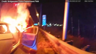 Hero police officer rescues passed out driver from blazing wreckage - Fox News