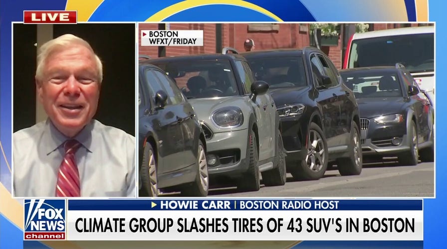 Climate activists slash tires of dozens of SUVs in Boston