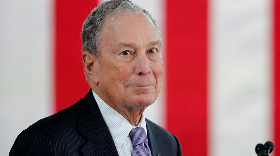 Bloomberg joins debate stage for first time in Nevada