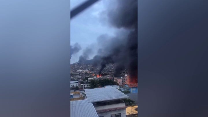 Rio de Janeiro police storm favelas in operation that kills 132