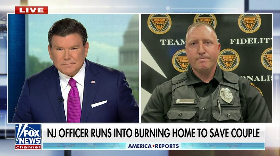 NJ officer rushes into burning home to save elderly couple