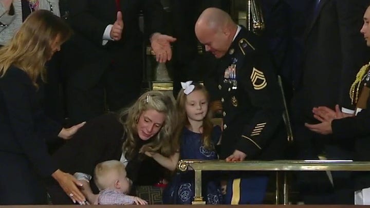 Soldier returns from Afghanistan, reunites with family at State of the Union