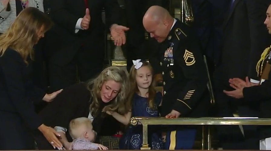 Soldier returns from Afghanistan, reunites with family at State of the Union