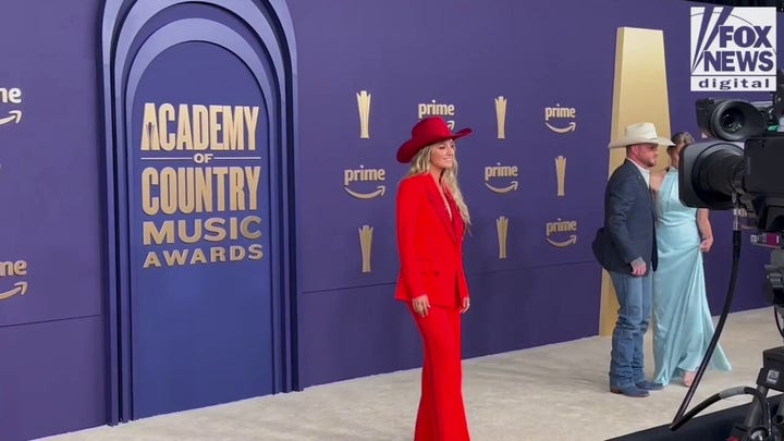 Lainey Wilson walks the red carpet at the 2024 ACM Awards