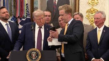 Trump reacts live to viral White House window video