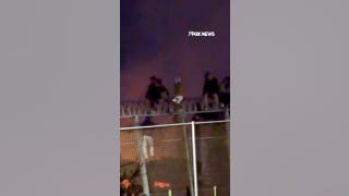 Migrants scale border fence into Spain