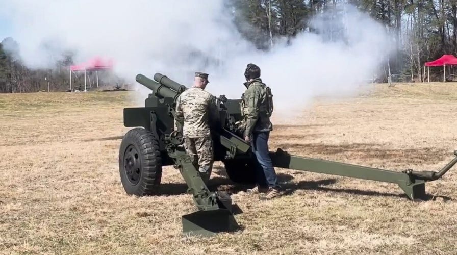 Vance fires weapons with Marines at Quantico