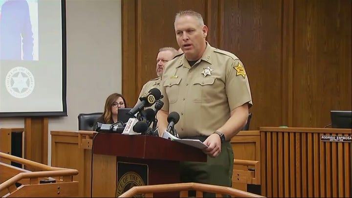 California family kidnapping: video shows suspect leading tied-up victims out of business