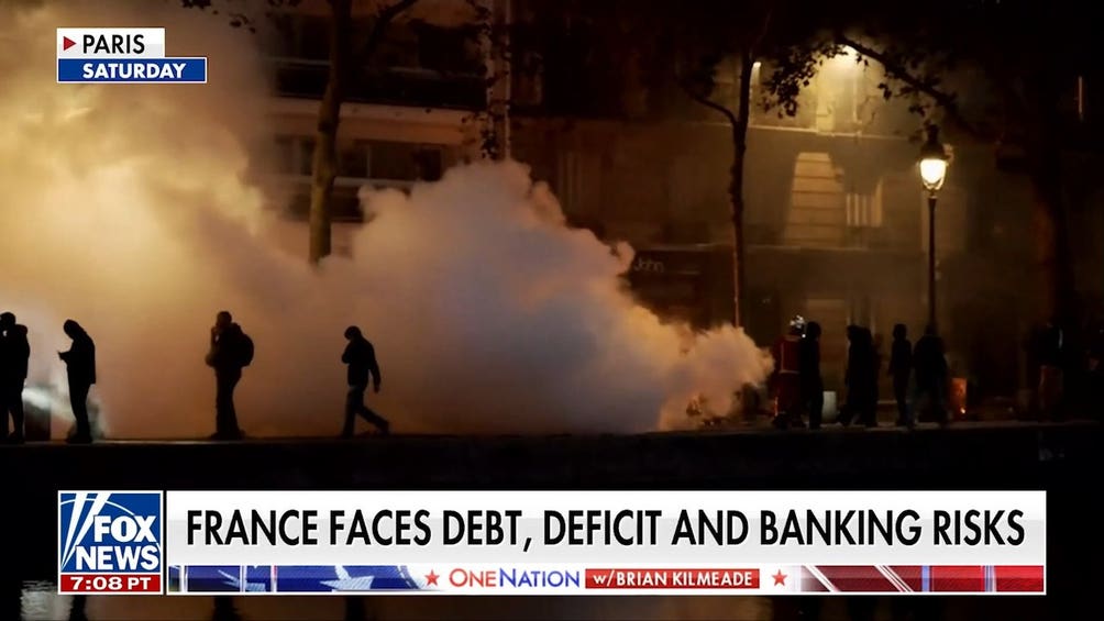 France faces debt, deficit and banking risks