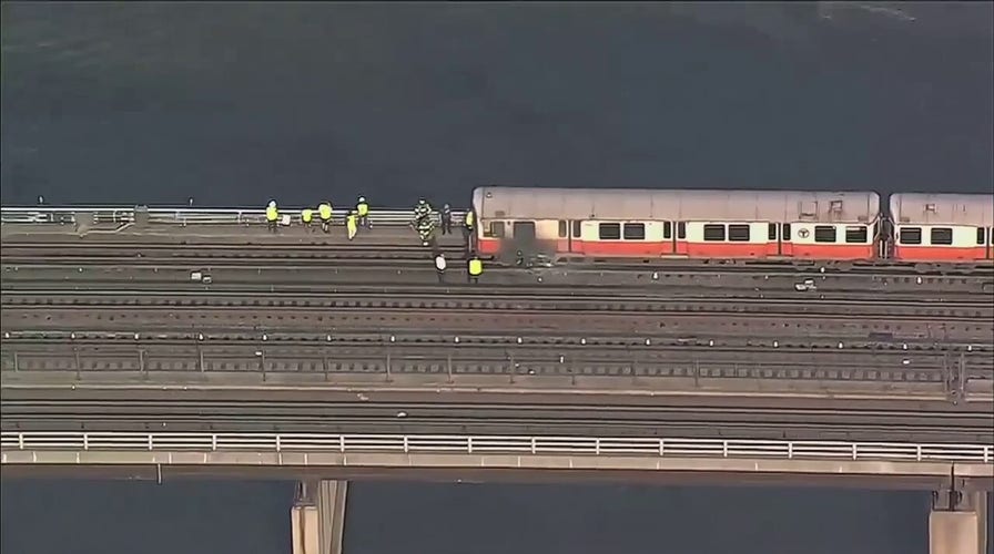 Massachusetts Bay Transportation Authority train catches fire