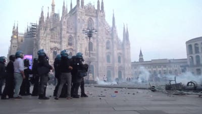 Protesters attack police by Milan's historic Cathedral