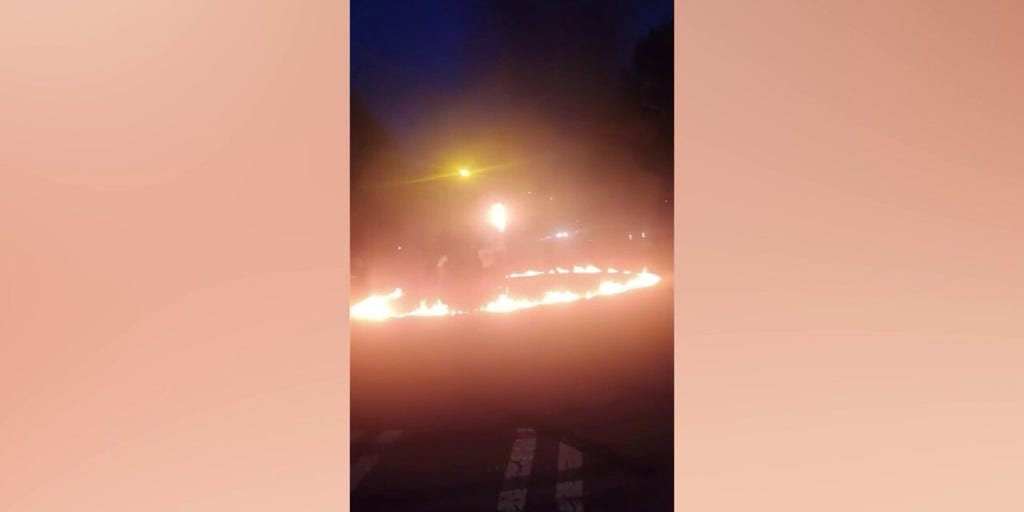 Video shows terrifying fire erupt during illegal street takeover packed with people