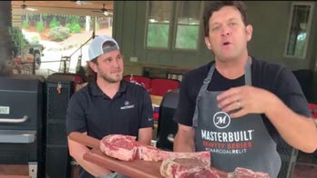 Chef John McLemore and son fire up the grill for Memorial Day weekend